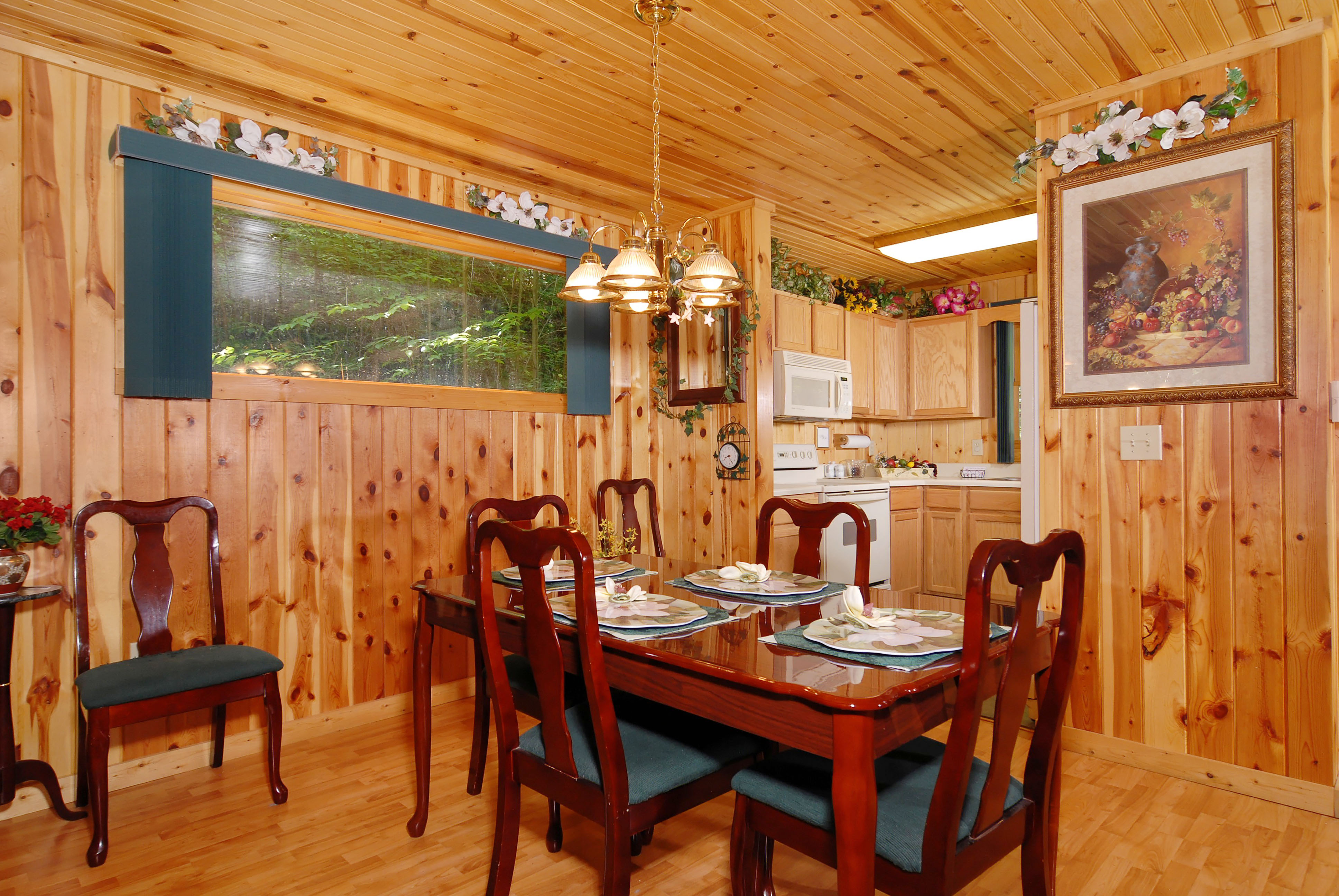 The dining room faces the u shaped kitchen and can seat 6. 